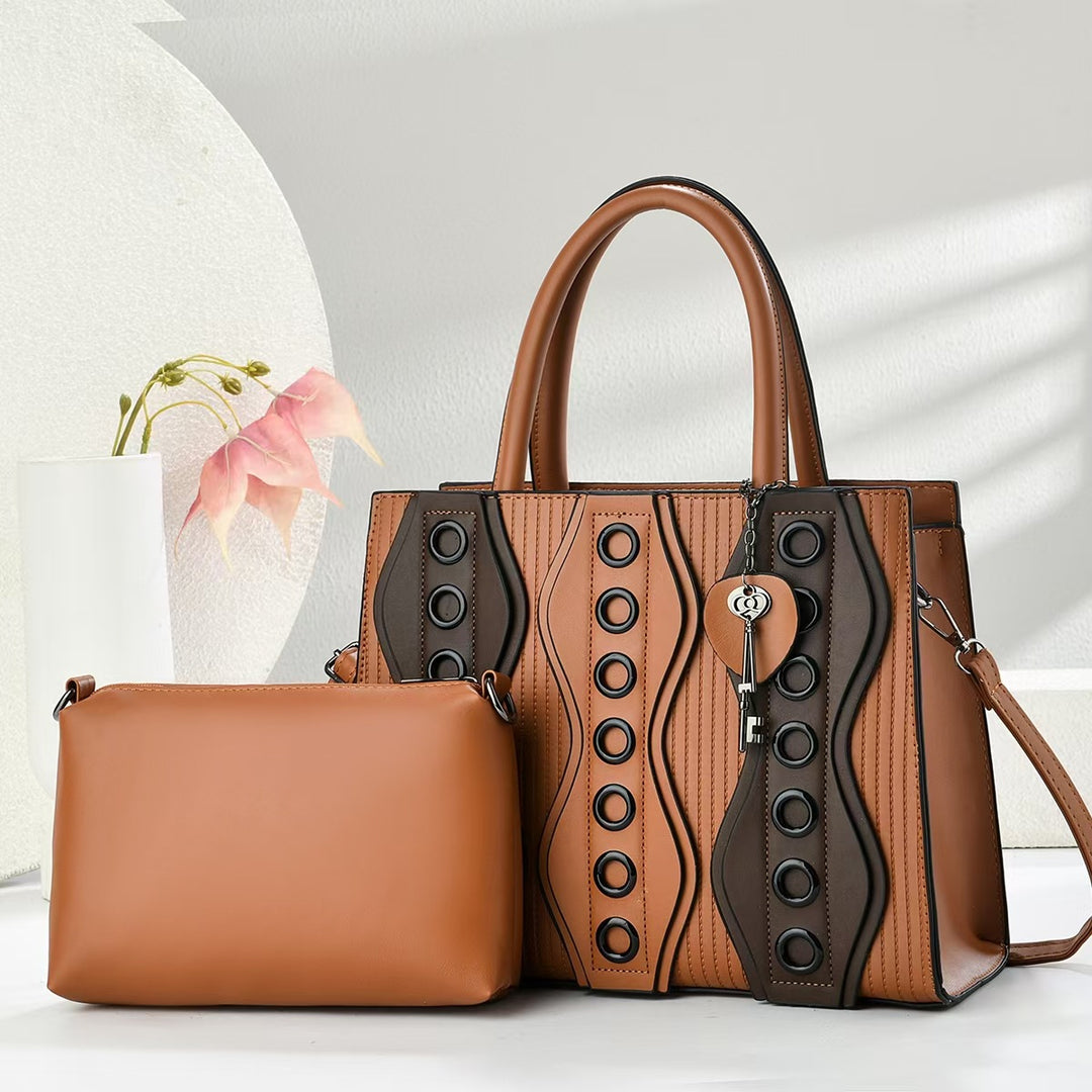 Damen elegante Handtasche mit dekorativen Details Nord Taschen