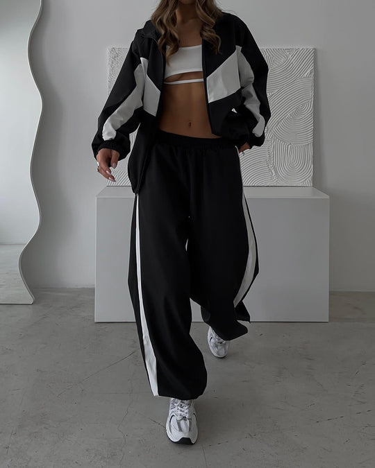 Damen sportives Zweiteiler-Set aus Oversize-Trackjacke mit Reißverschluss und weitem Bundfalten-Hose Nord Taschen