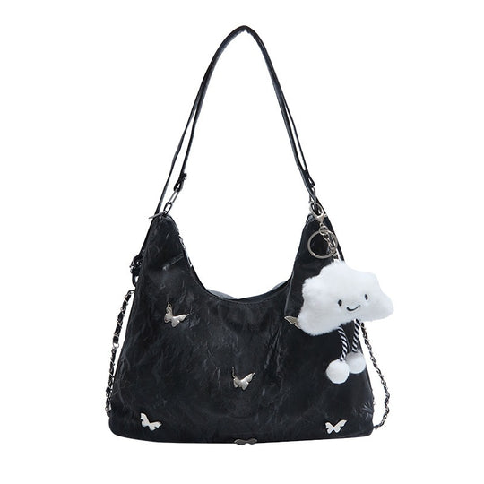 Damen modische Hobo-Tasche mit verspieltem Anhänger und detailreicher Verzierung Nord Taschen