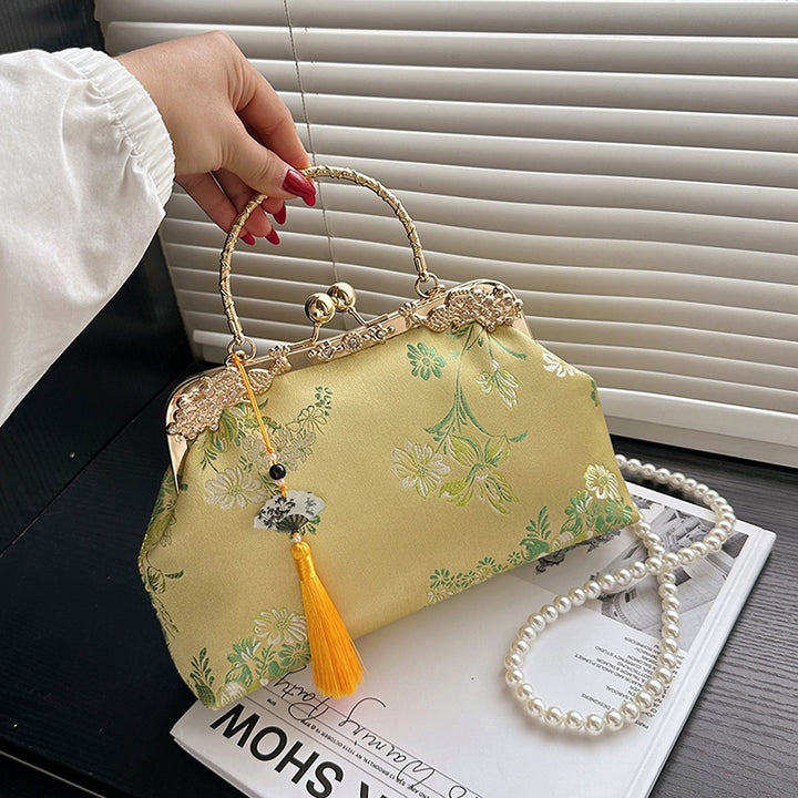 Damen elegante Umhängetasche mit floralem Design und goldenen Akzenten Nord Taschen