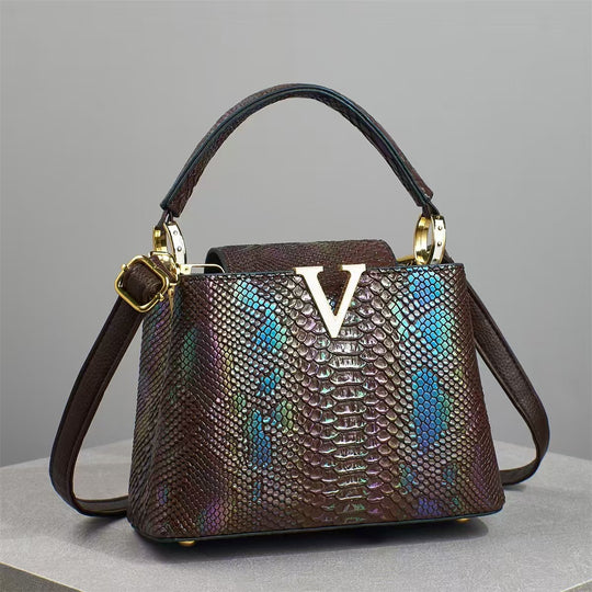 Damen stilvolle Handtasche mit Schlangenlederoptik Nord Taschen