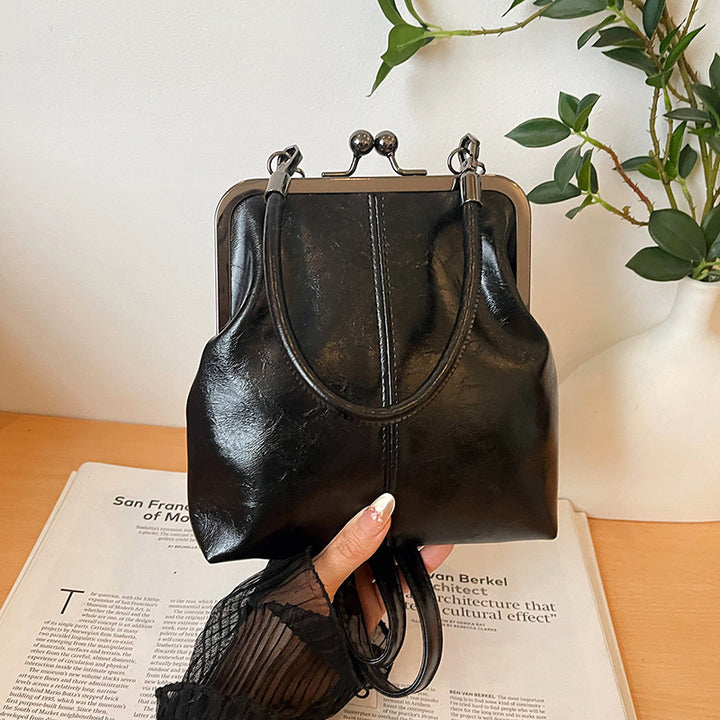 Damen elegante Umhängetasche mit stylischem Metallverschluss Nord Taschen