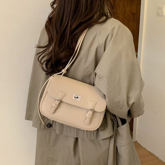 Damen elegante Umhängetasche aus strukturiertem Kunstleder mit praktischen Schnallen Nord Taschen