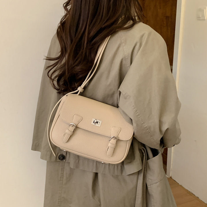 Damen elegante Umhängetasche aus strukturiertem Kunstleder mit praktischen Schnallen Nord Taschen
