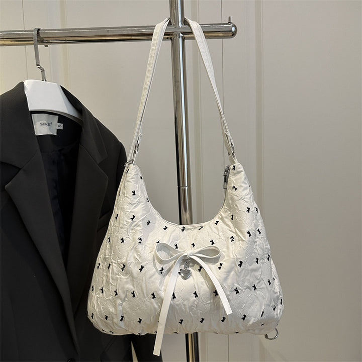 Damen modische Schultertasche mit schimmernder Oberfläche und dekorativen Details Nord Taschen