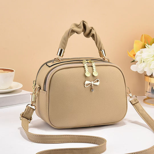 Damen Handtasche mit geflochtenem Tragegriff und edlem Zipper Nord Taschen