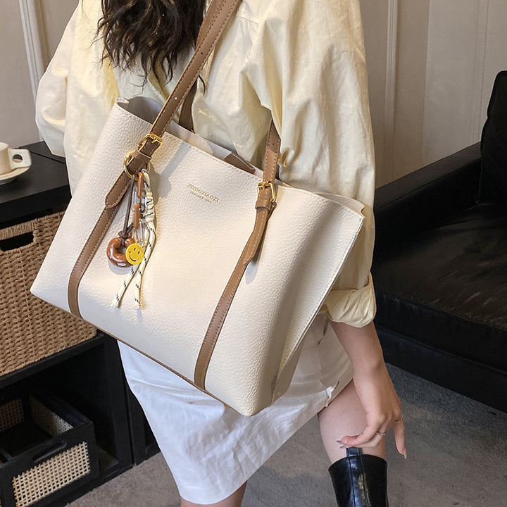 Damen elegante Handtasche im minimalistischen Stil mit einzigartigem Anhänger Nord Taschen