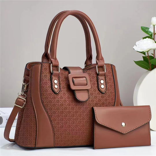 Damen modische Handtasche mit anspruchsvollem Reliefdesign und abnehmbarer Clutch Nord Taschen