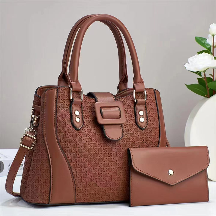 Damen modische Handtasche mit anspruchsvollem Reliefdesign und abnehmbarer Clutch Nord Taschen