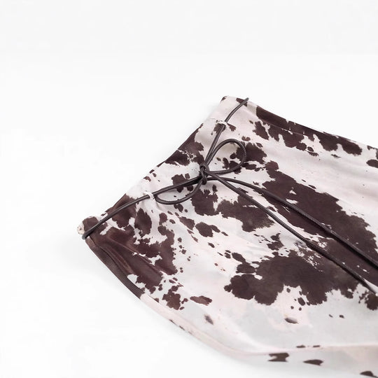 Damen Oversize-Hemdbluse mit Kuhflecken-Print, verdeckter Knopfleiste und weitem Schnitt Nord Taschen