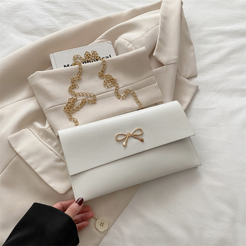Damen elegante Clutch im minimalistischen Design mit goldenen Akzenten Nord Taschen