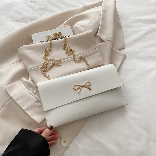 Damen elegante Clutch im minimalistischen Design mit goldenen Akzenten Nord Taschen