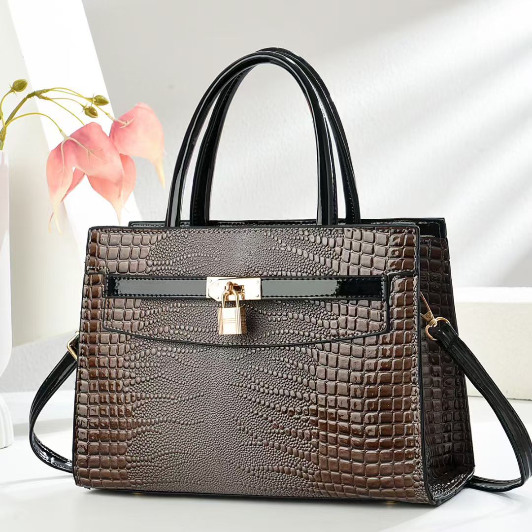 Damen elegante Handtasche mit Schlangenleder-Optik Nord Taschen