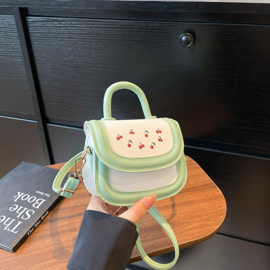 Damen Mini-Handtasche mit fröhlichem Kirschdesign und charmanten Anhängern Nord Taschen