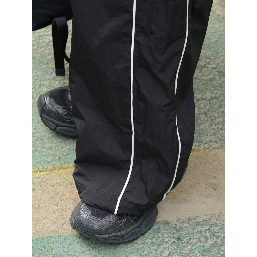 Damen Weite Nylon-Trainingshose mit Kontrastpaspeln und Elastbund Nord Taschen