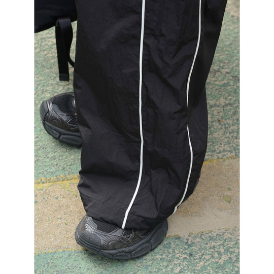 Damen Weite Nylon-Trainingshose mit Kontrastpaspeln und Elastbund Nord Taschen