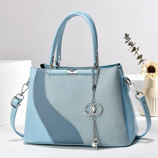 Damen Handtasche aus hochwertigem Kunstleder mit detailverliebtem Design und abnehmbarem Schulterriemen Nord Taschen