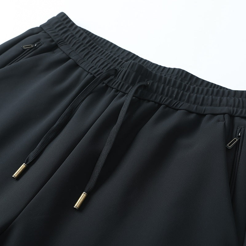Herren Slim-Tapered Performance-Jogginghose aus wasserabweisendem Funktionsstoff mit elastischem Kordelbund & verdeckten Reißverschlusstaschen Nord Taschen