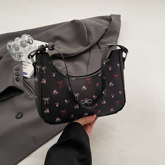 Damen Umhängetasche mit floralen Applikationen und verspieltem Schleifenverschluss Nord Taschen