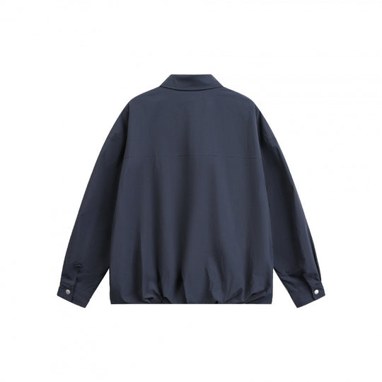 Unisex Boxy-Hemdjacke mit Druckknopfleiste, Hemdkragen und elastischem Saum Nord Taschen