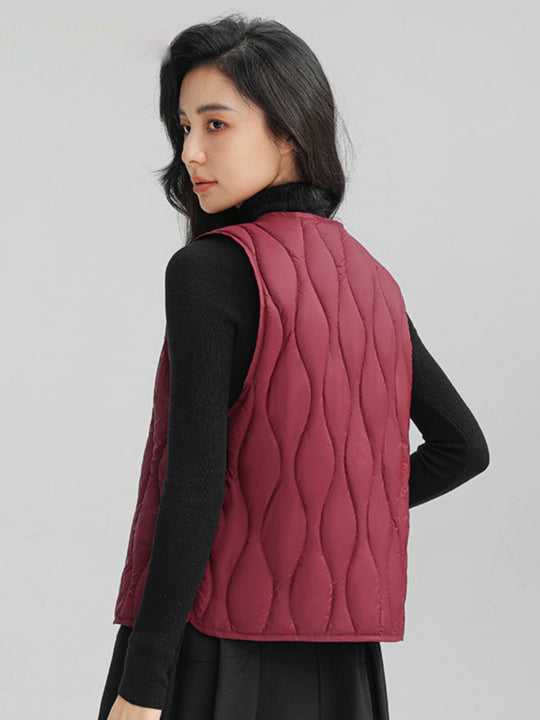 Damen Lange gesteppte Thermoweste mit ergonomischer Wellensteppung Nord Taschen