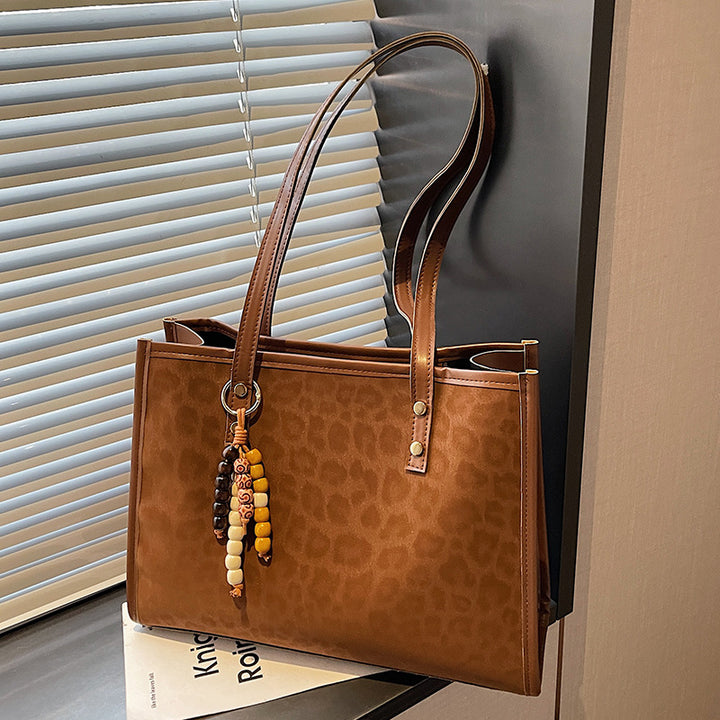 Damen Umhängetasche mit modernem Leopardenmuster und praktischen Details Nord Taschen