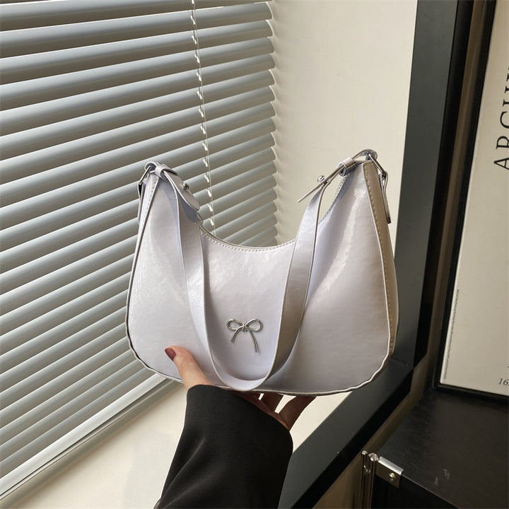 Damen Hobo-Tasche aus glänzendem Kunstleder mit dekorativem Schleifendetail Nord Taschen
