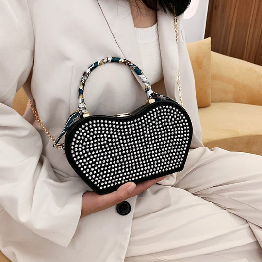 Damen Handtasche mit funkelnden Strasssteinen und modischem Schal | Nord Taschen