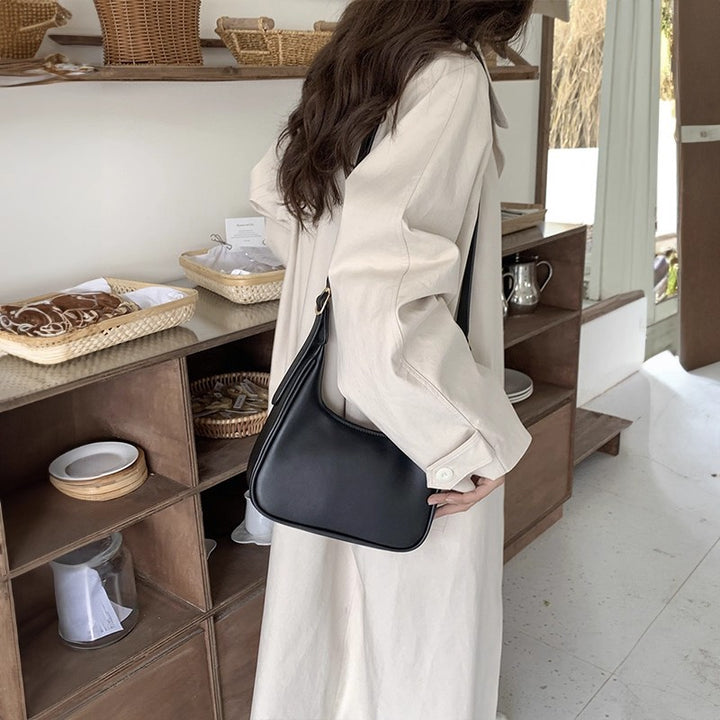 Damen Hobo-Tasche mit eleganter Linienführung und hochwertigem Kunstleder Nord Taschen