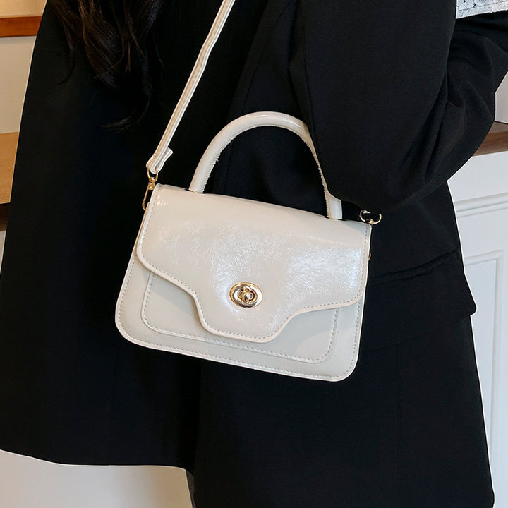 Damen Handtasche mit hochwertigem Kunstleder und elegantem Klappenverschluss Nord Taschen