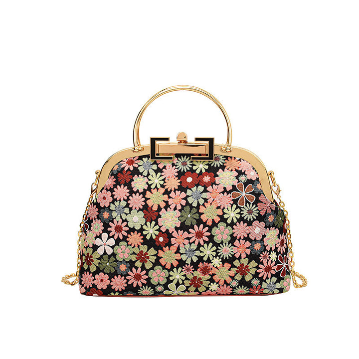Damen elegante Umhängetasche mit floralen Akzenten und goldenen Verzierungen Nord Taschen