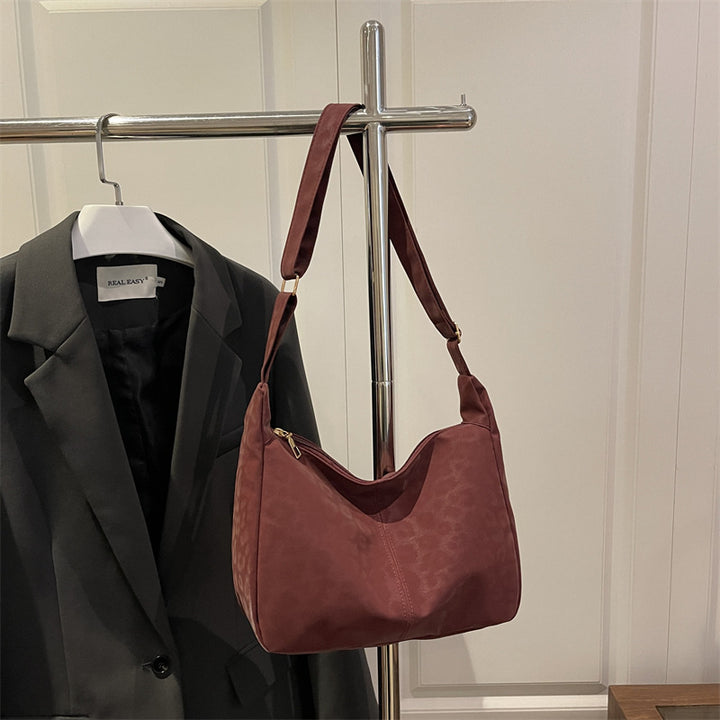 Damen Umhängetasche mit eleganter Leopardenstruktur Nord Taschen