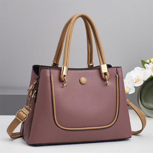 Damen Handtasche mit goldenen Akzenten und eleganter Struktur Nord Taschen