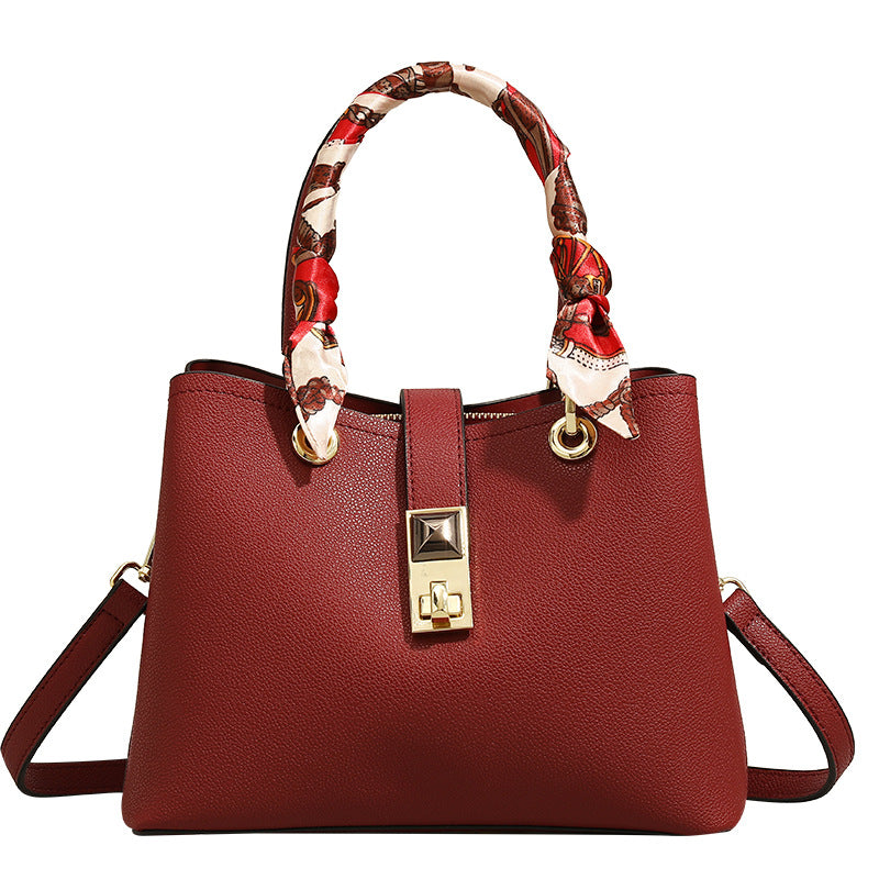Damen Handtasche mit verspieltem Halstuch-Detail und elegantem Leder Nord Taschen