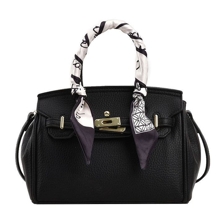 Damen Handtasche mit innovativem Haltegriff und modischen Details | Nord Taschen