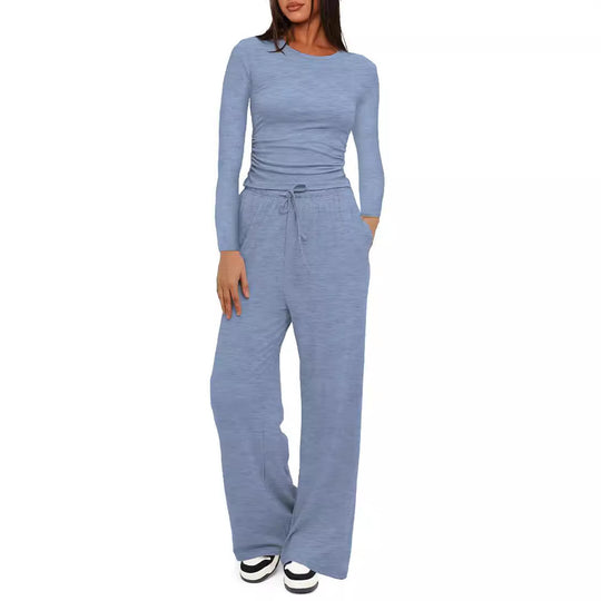 Damen Figurnahe Langarmshirt mit seitlicher Raffung und weiter Tunnelzug-Jogginghose Nord Taschen