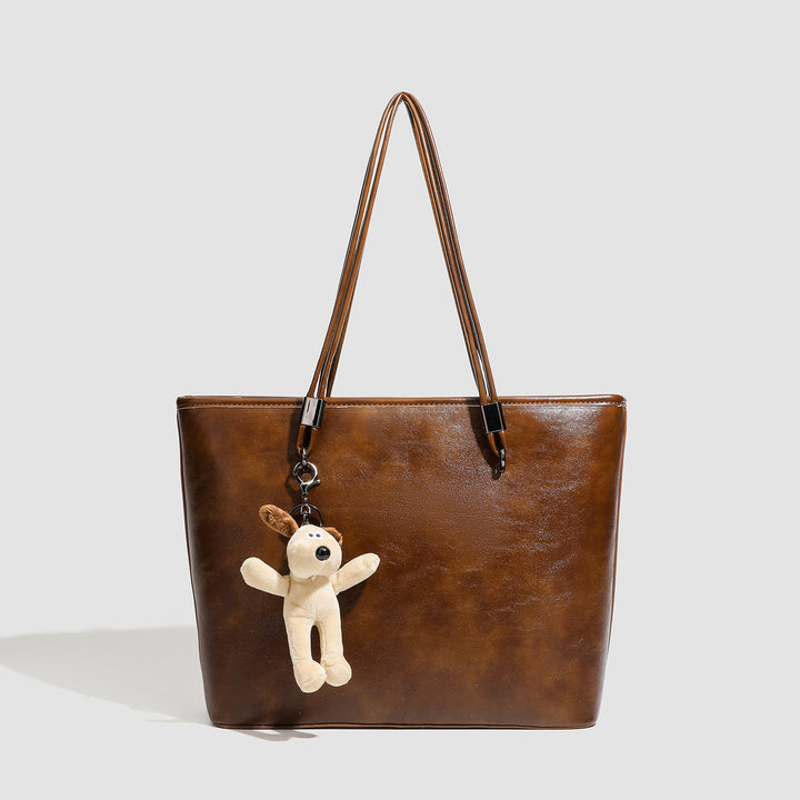 Damen Shopper-Tasche aus hochwertigem Kunstleder mit verspieltem Anhänger Nord Taschen