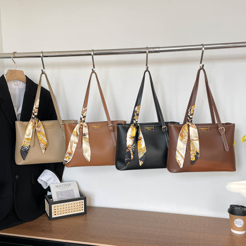 Damen elegante Handtasche mit modischem Schal-Akzent Nord Taschen