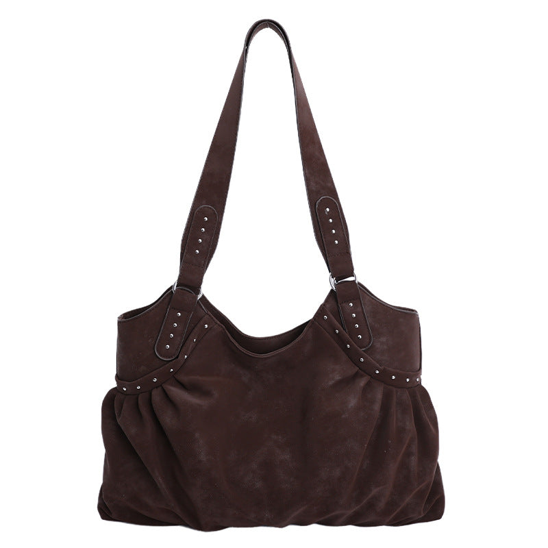 Damen Tasche mit raffiniertem Rüschendesign und Akzenten aus Metall von Nord Taschen