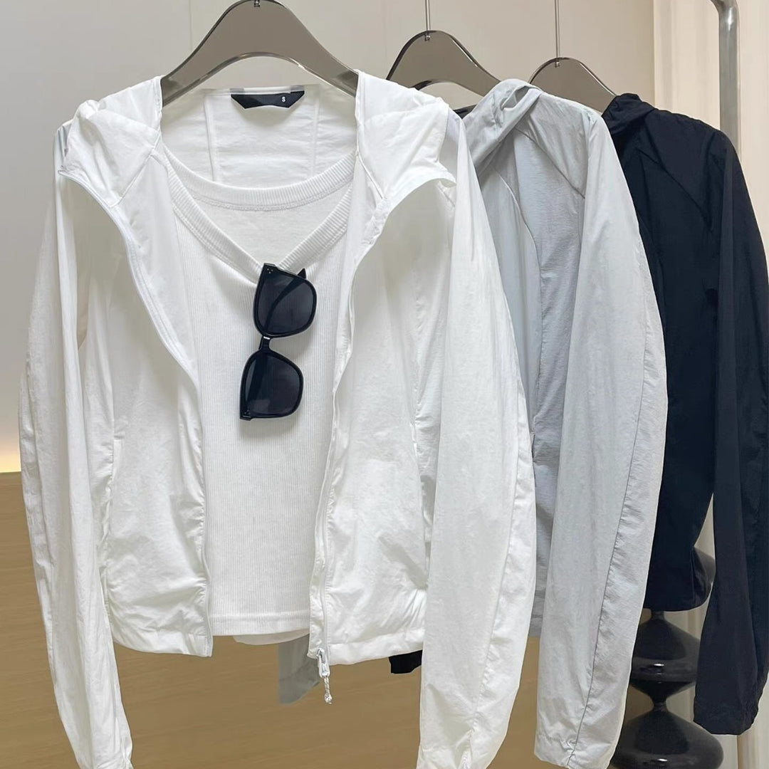Damen Leichte Kapuzen-Windjacke mit Reißverschluss und verstellbarem Saum Nord Taschen