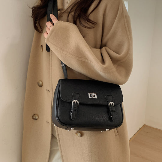 Damen elegante Umhängetasche aus strukturiertem Kunstleder mit praktischen Schnallen Nord Taschen