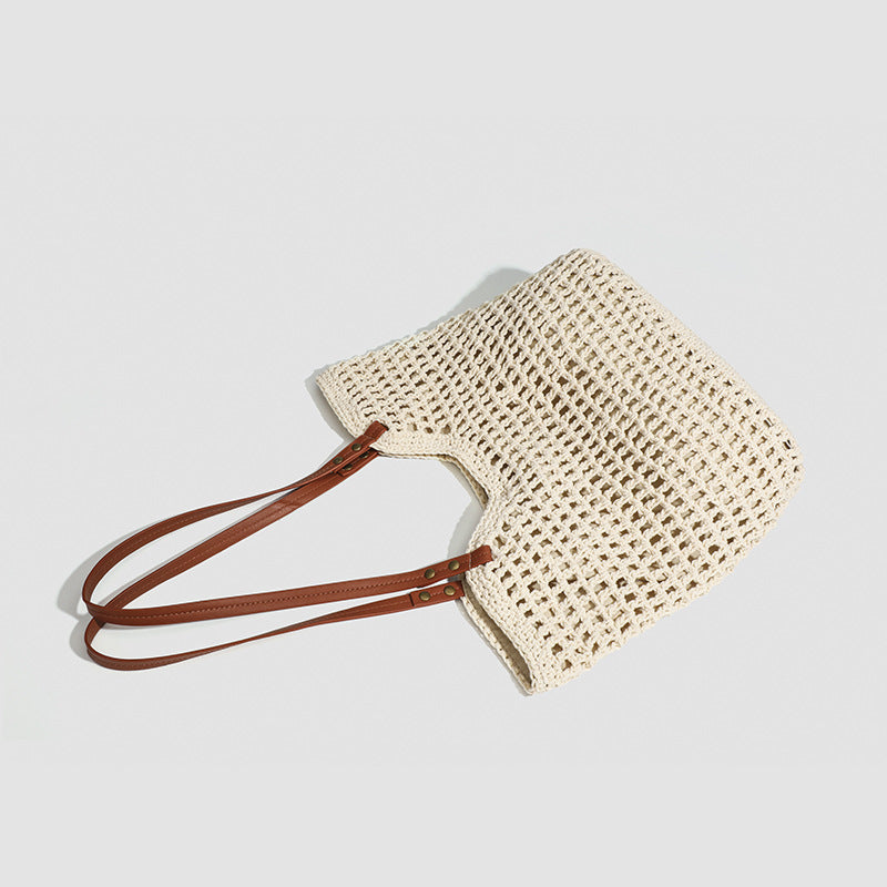 Damen Handtasche aus gewebtem Naturmaterial mit eleganten Lederakzenten Nord Taschen