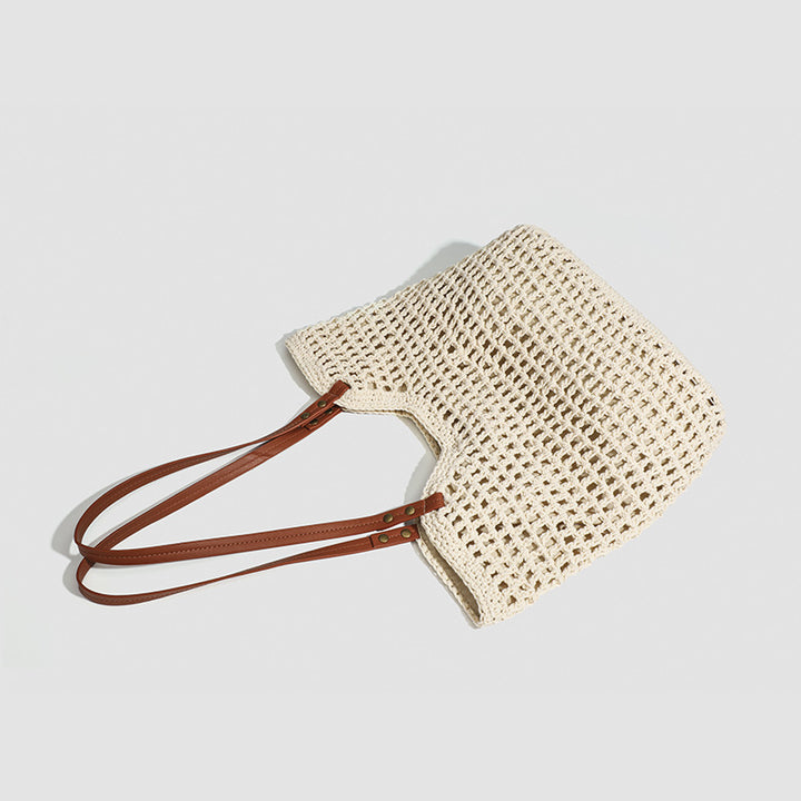 Damen Handtasche aus gewebtem Naturmaterial mit eleganten Lederakzenten Nord Taschen