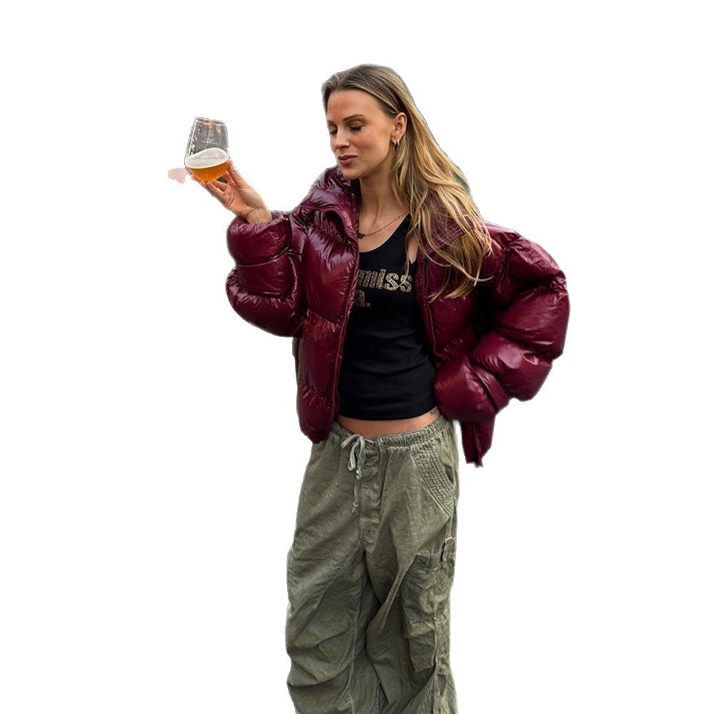 Damen Glänzende Oversize-Steppjacke mit Kapuze und hohem Stehkragen Nord Taschen