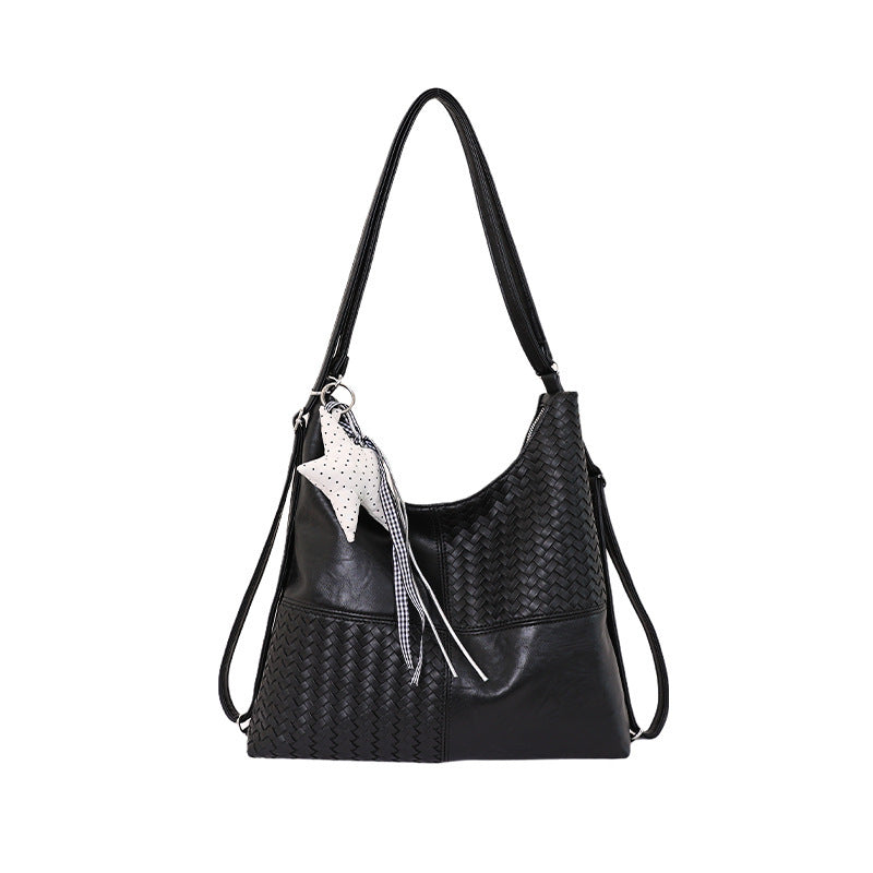 Damen Beuteltasche aus kunstvoll geflochtenem Leder mit elegantem Design Nord Taschen