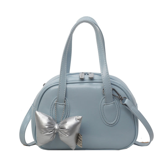 Damen Designer-Handtasche im verspielten Stil mit dekorativem Schleifen-Detail | Nord Taschen