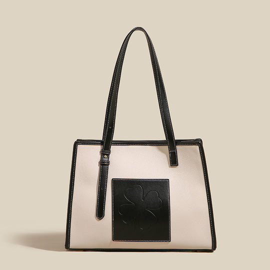 Damen elegante Tote-Tasche mit strukturiertem Leder und verspieltem Kleeblatt-Akzent Nord Taschen