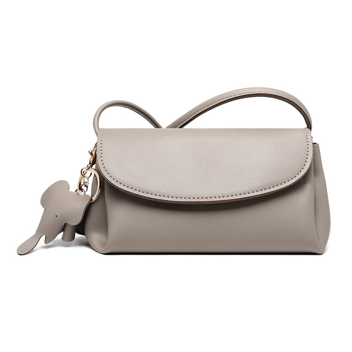 Damen Clutch-Tasche mit eleganter Klappenöffnung und charmantem Anhänger Nord Taschen