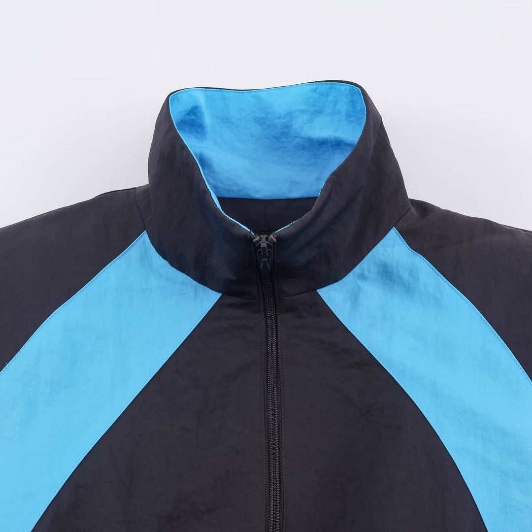 Damen Retro-Colorblock Windbreaker mit Tunnelzug und Stehkragen Nord Taschen