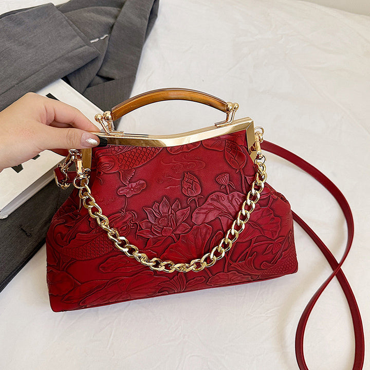 Damen elegante Handtasche mit floralem Präge-Design Nord Taschen